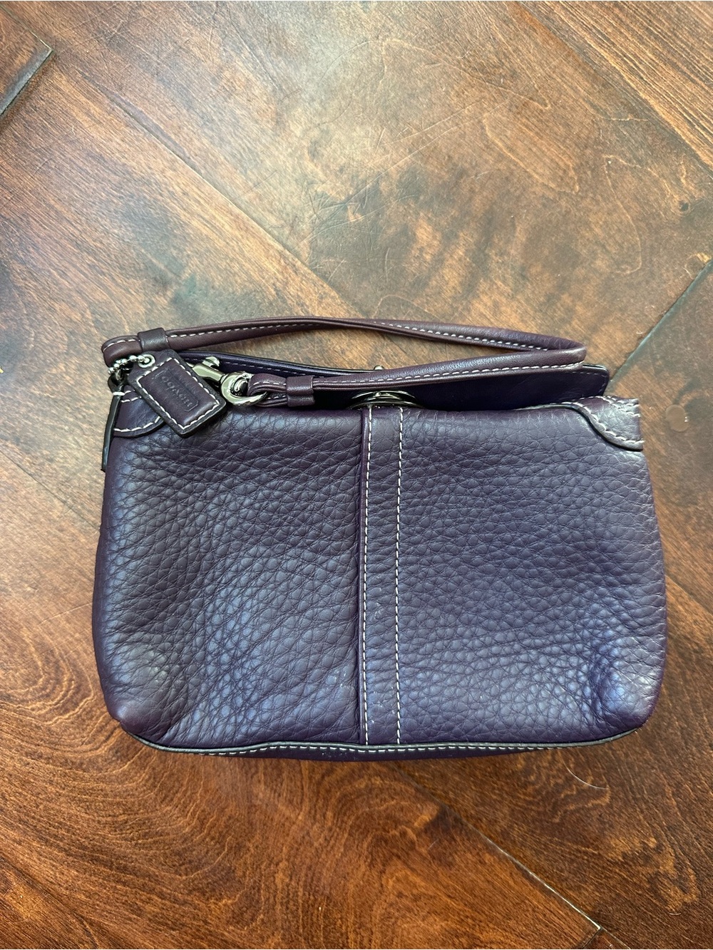 Coach Pebbled Leather Wristlet in Plum